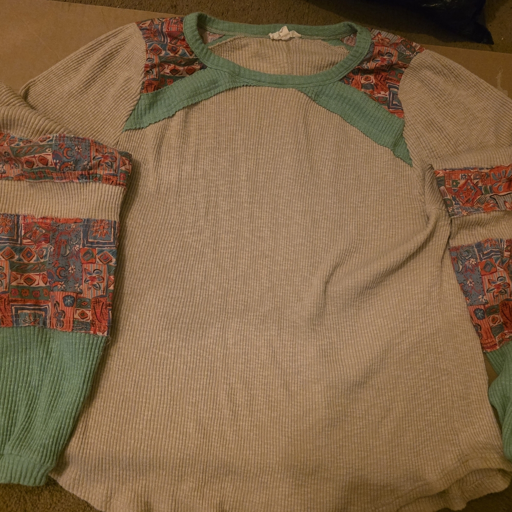 easel Cream Knit Sweater with Teal Trim and Multicolor Patchwork Sleeves